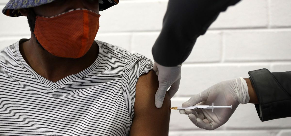 Man Receiving COVID Vaccine.jpg